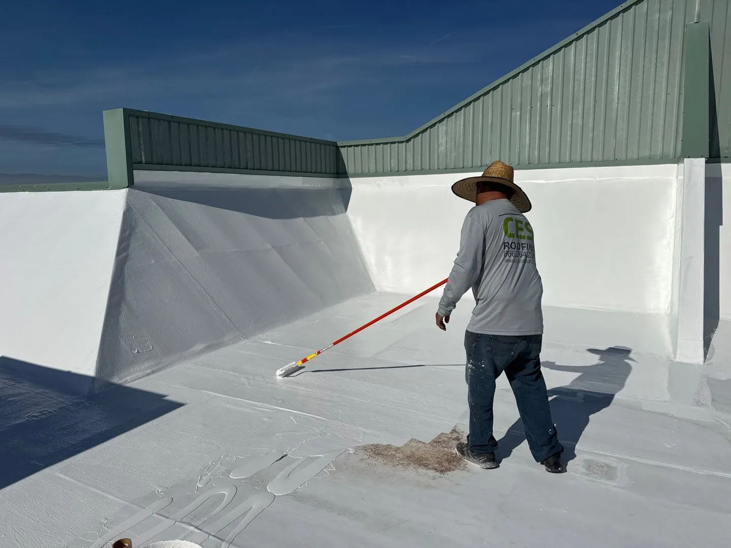 Silicone roof coating on a commercial roof